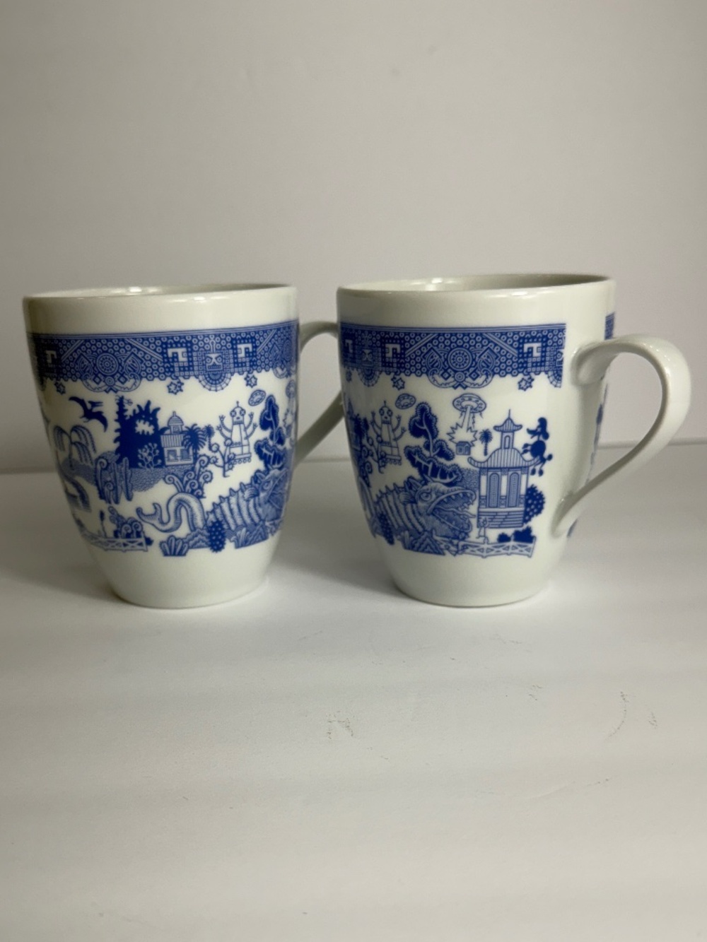 Calamityware Set of 2 Blue White Mugs